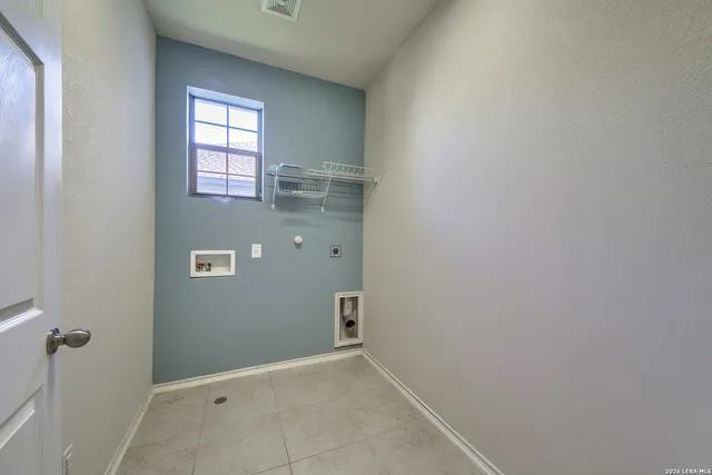 a view of a backyard with a small cabin