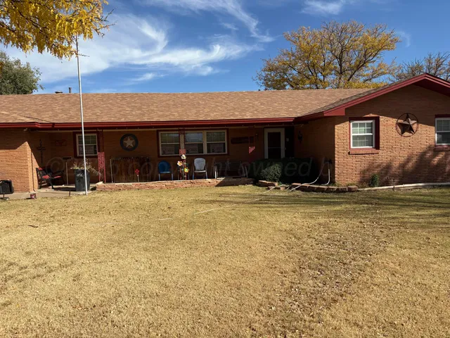 a view of swimming pool with a patio