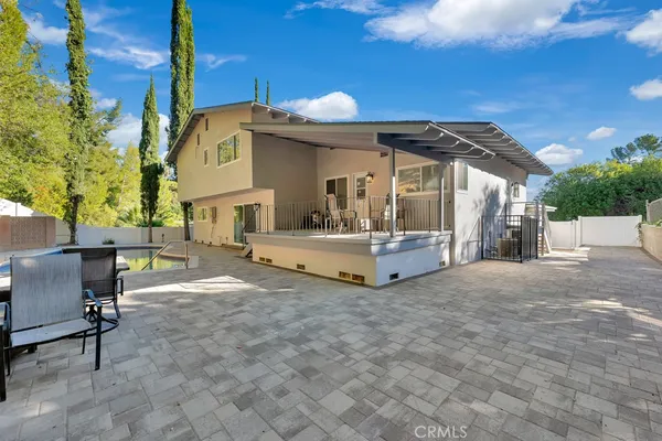 a view of a pathway of a house with wooden floor