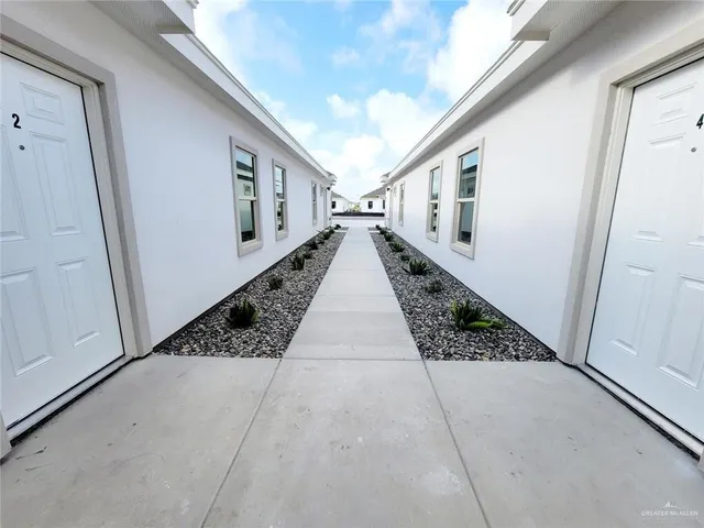 a view of a house with a garden