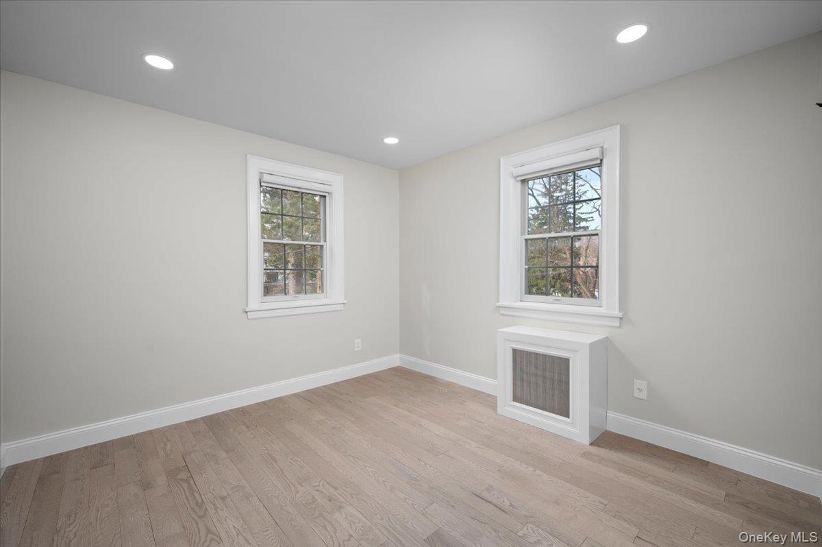28 Cross Street Bronxville, NY 10708 - Photo 16 of 34 an empty room with windows and closet