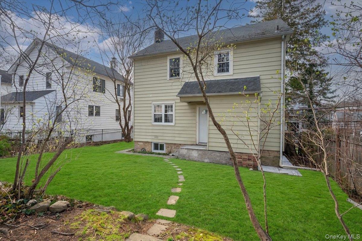 28 Cross Street Bronxville, NY 10708 - Photo 32 of 34 a view of a house with a yard