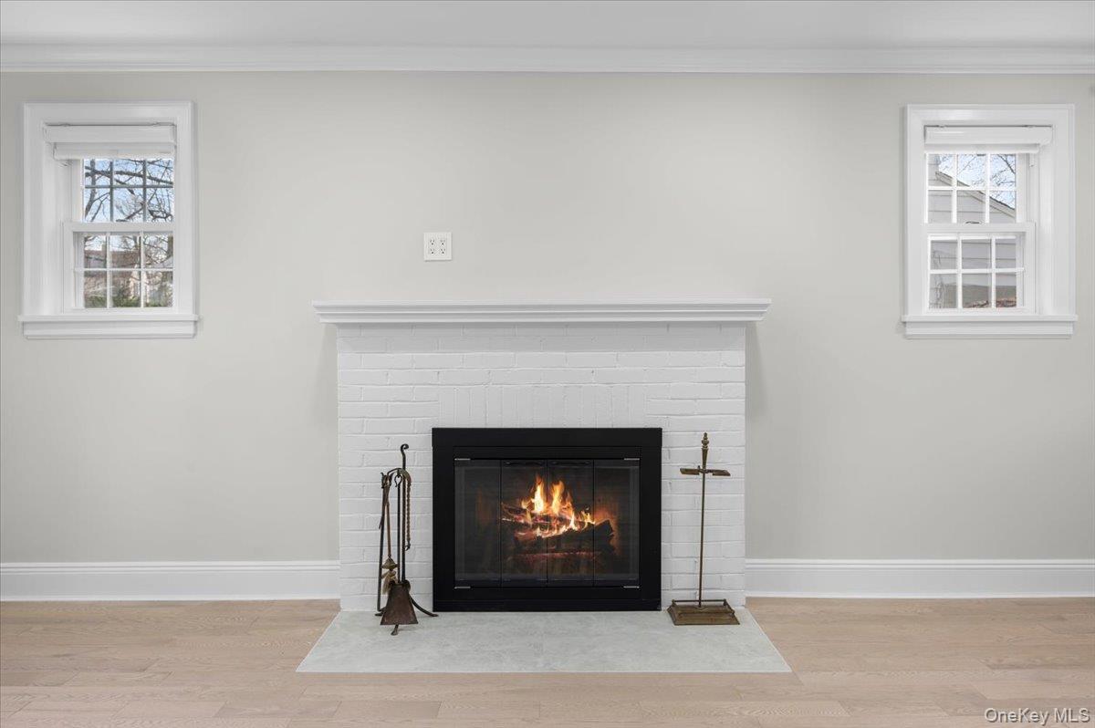 28 Cross Street Bronxville, NY 10708 - Photo 7 of 34 a living room with a fireplace