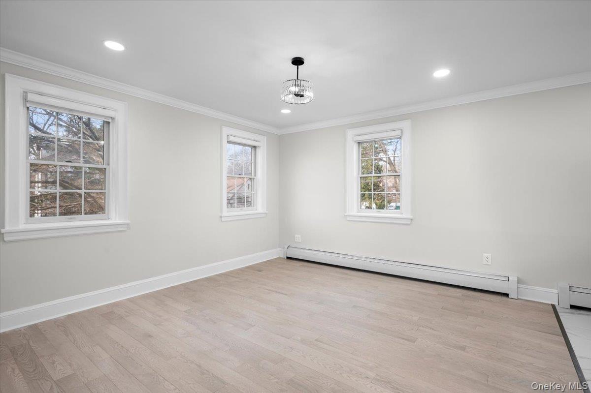 28 Cross Street Bronxville, NY 10708 - Photo 8 of 34 a view of an empty room with a window