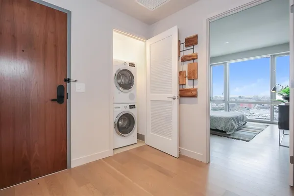 a view of a kitchen and utility room