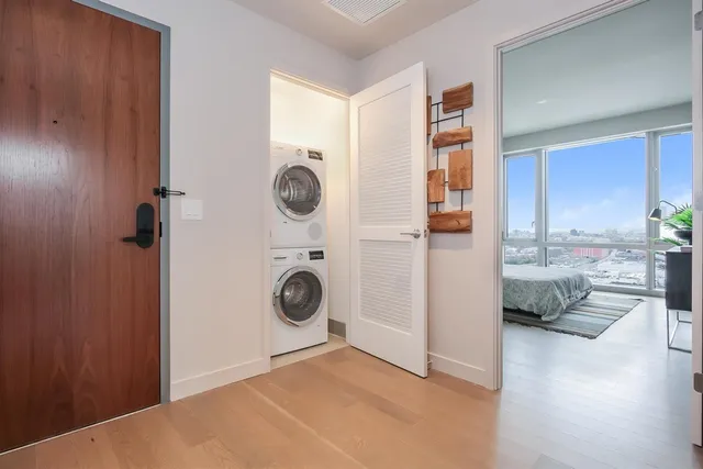a view of a kitchen and utility room