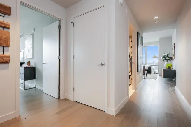 wooden floor in a hall with an entryway