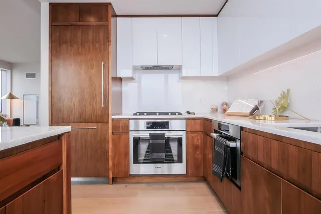 a kitchen with a stove and a sink