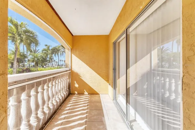 a view of a glass door with glass windows