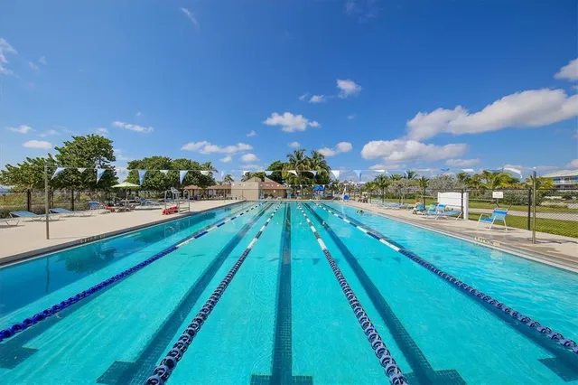 a view of a yard with swimming pool