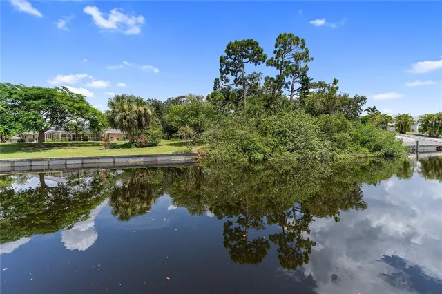 a view of a lake with a houses