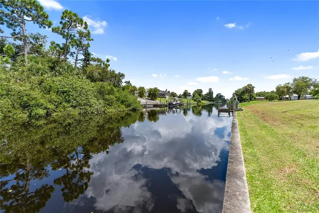 a view of a lake from a yard