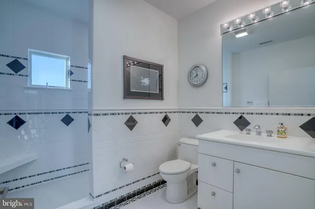 an aerial view of a house with a ocean view