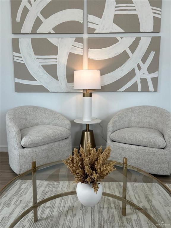 5323 Vision Street Rio Grande City, TX 78582 - Photo 12 of 16 Living area with wood finished floors