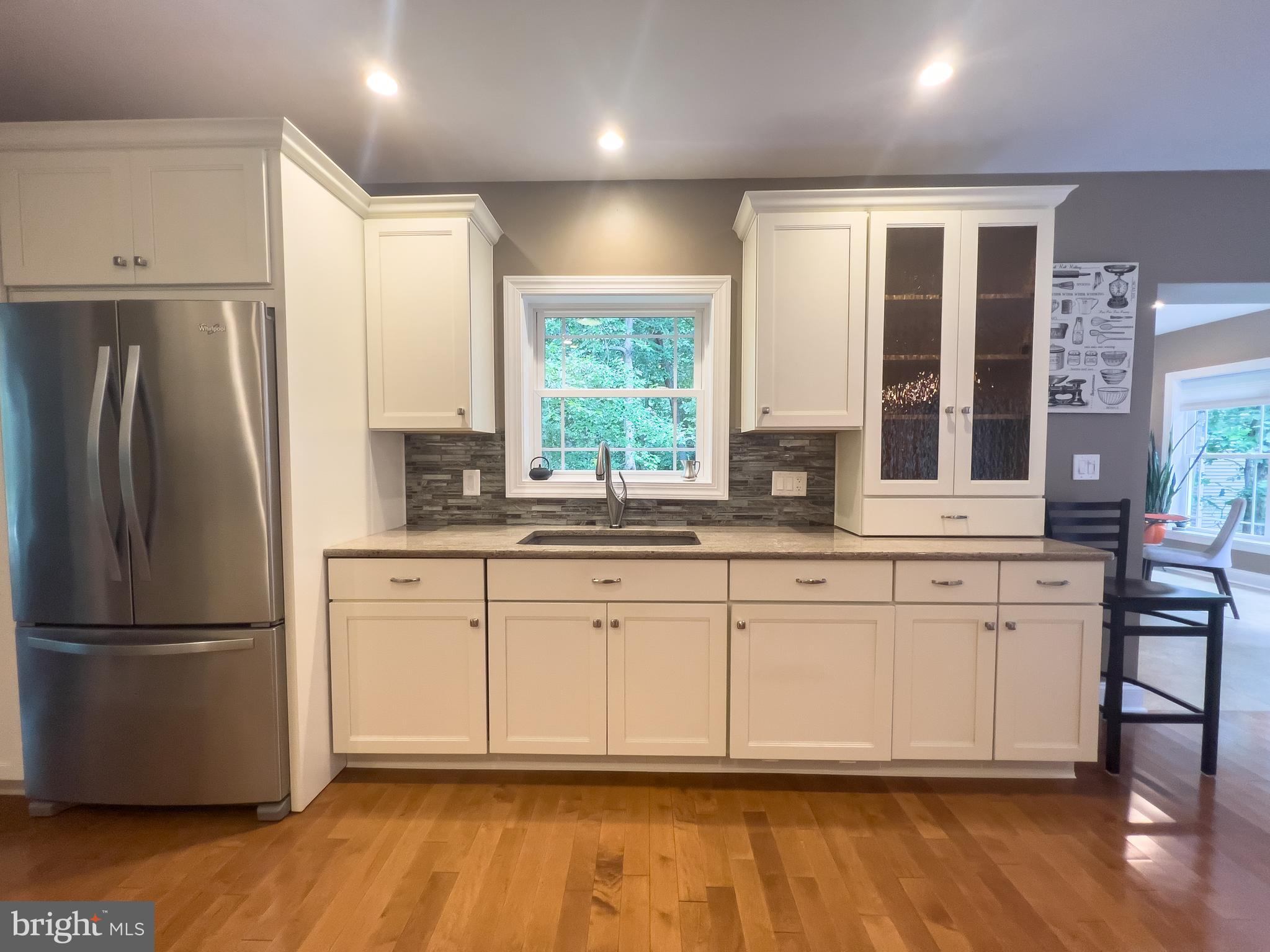606 Old Indian Mills Road Tabernacle, NJ 08088 - Photo 9 of 43 a kitchen with stainless steel appliances granite countertop a refrigerator a sink and white cabinets