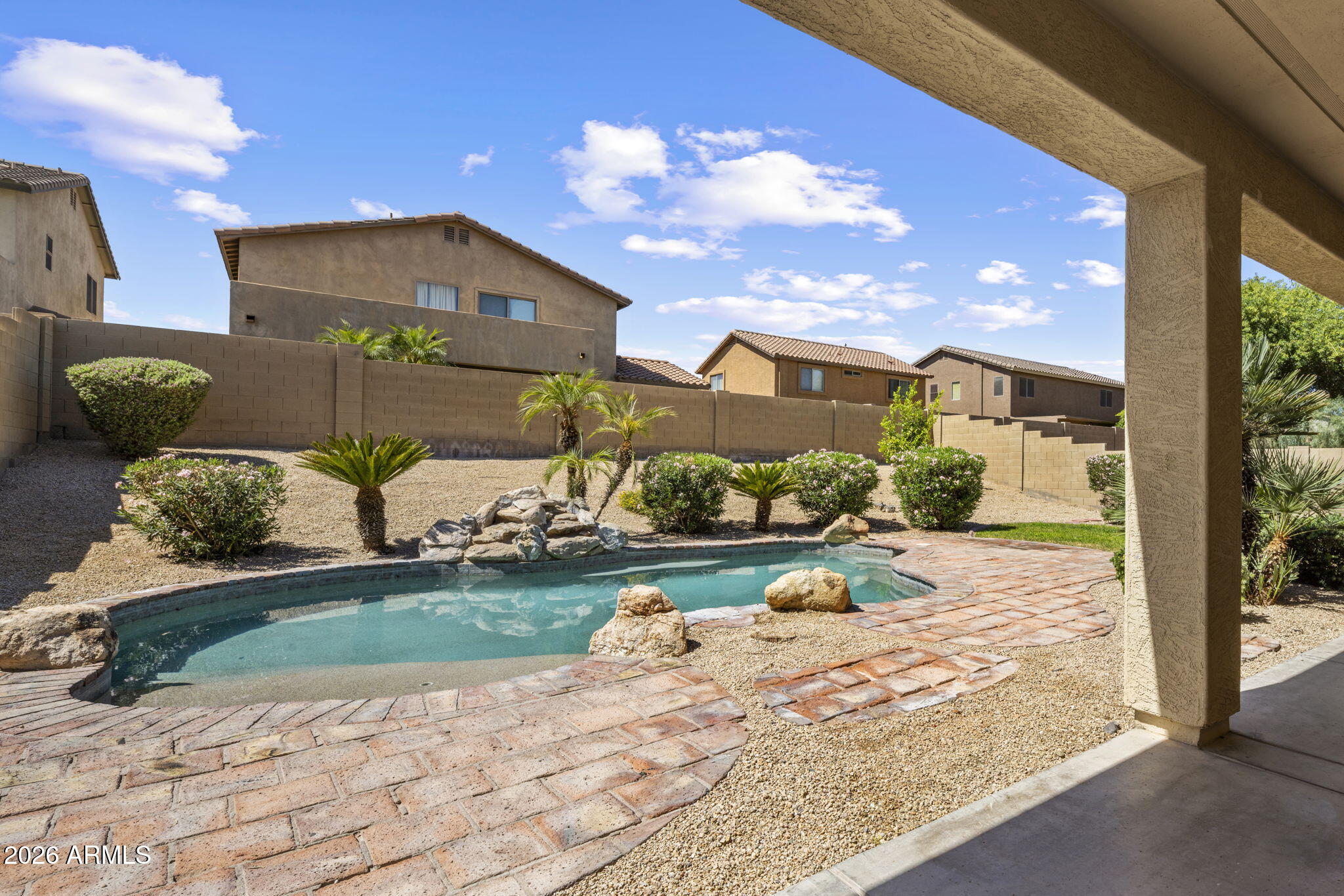 5121 West Beverly Road Laveen, AZ 85339 - Photo 5 of 32 a view of a porch with a yard
