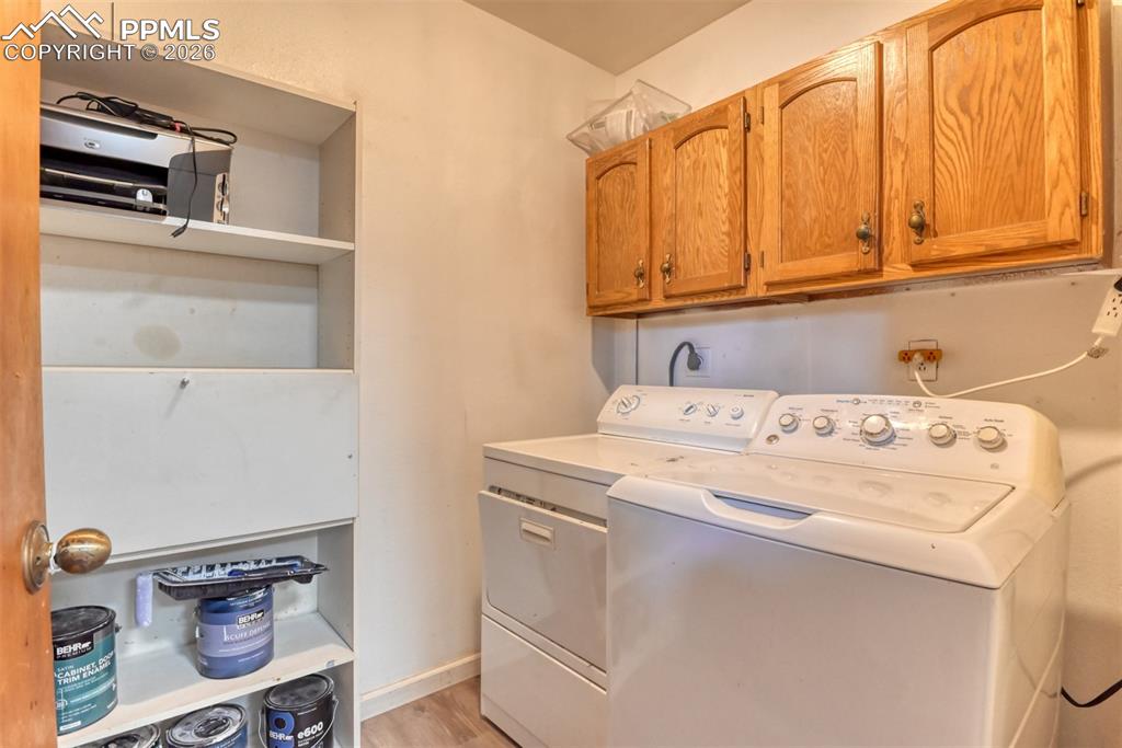 632 Santa Fe Street Colorado Springs, CO 80903 - Photo 13 of 24 a utility room with dryer and washer