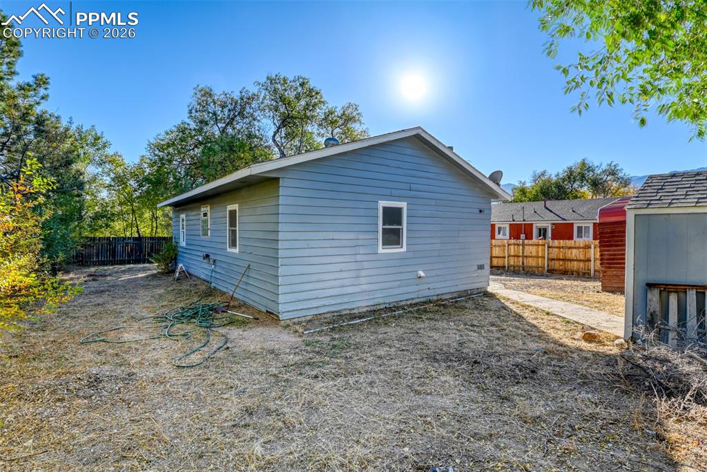 632 Santa Fe Street Colorado Springs, CO 80903 - Photo 5 of 24 a view of a house with a yard
