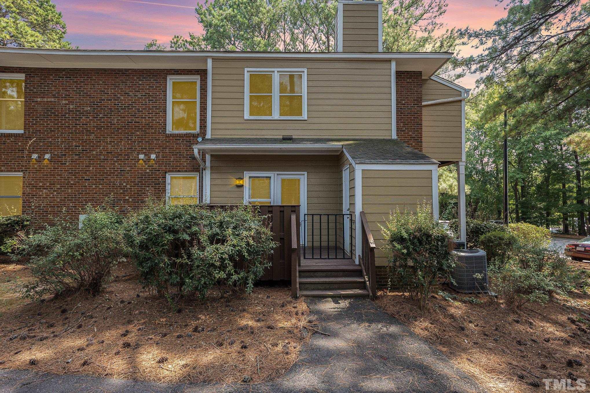a house view with a garden space