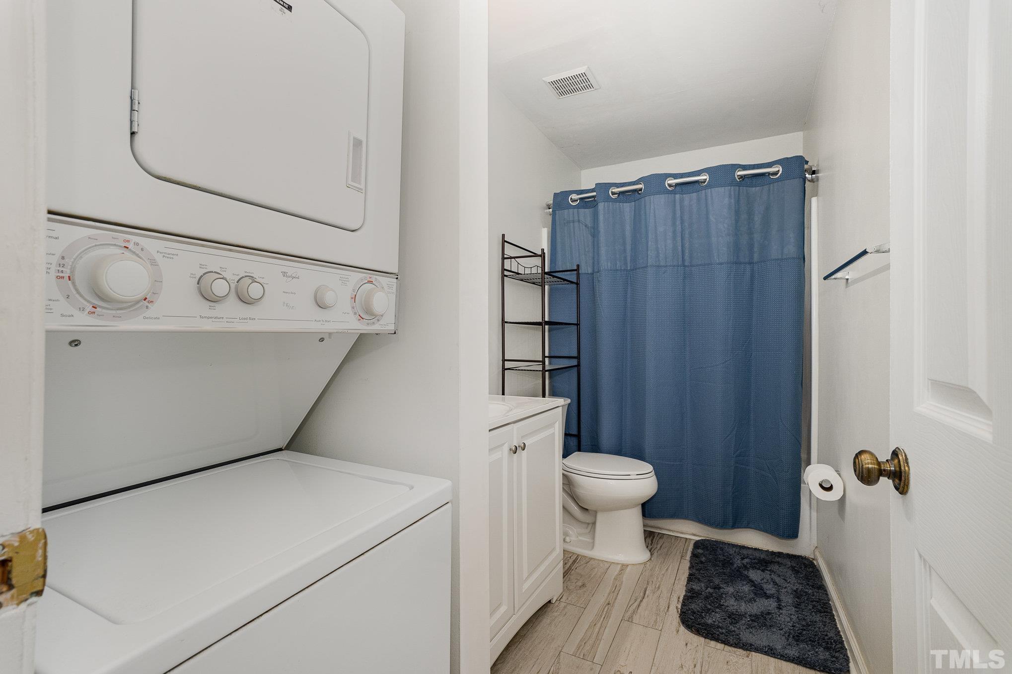 3219 Mill Run, Unit 175 Raleigh, NC 27612 - Photo 12 of 16 a utility room with dryer and washer