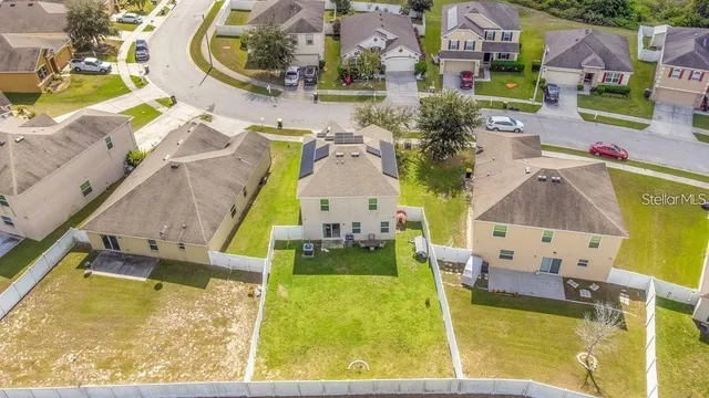 an aerial view of a swimming pool