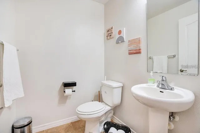 a bathroom with a sink and a toilet
