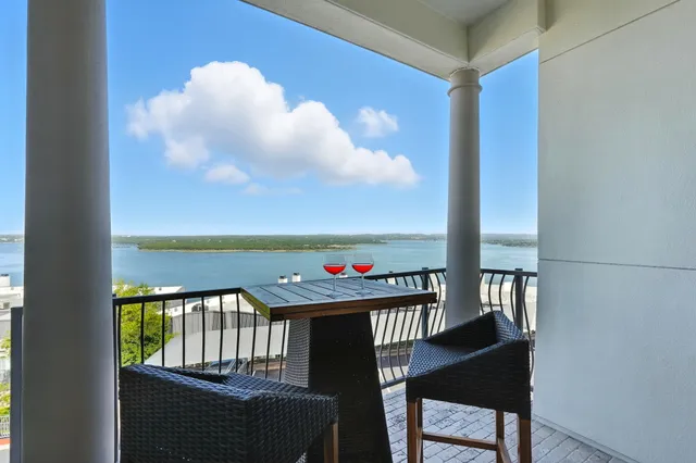 a view of a dining room with furniture and a window