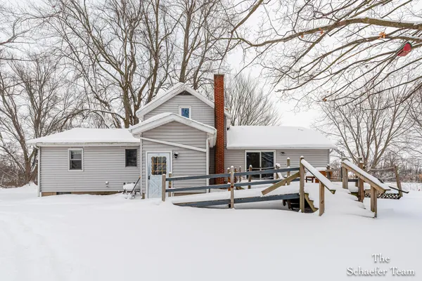 $338,000 | 4885 Gavin Lake Road Northeast, Ada, MI 49301