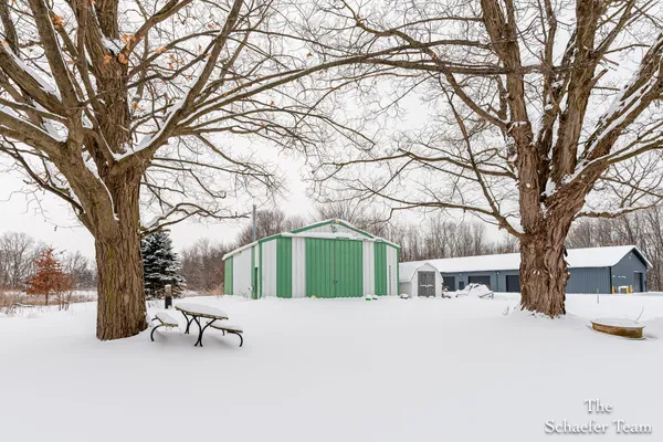 $338,000 | 4885 Gavin Lake Road Northeast, Ada, MI 49301