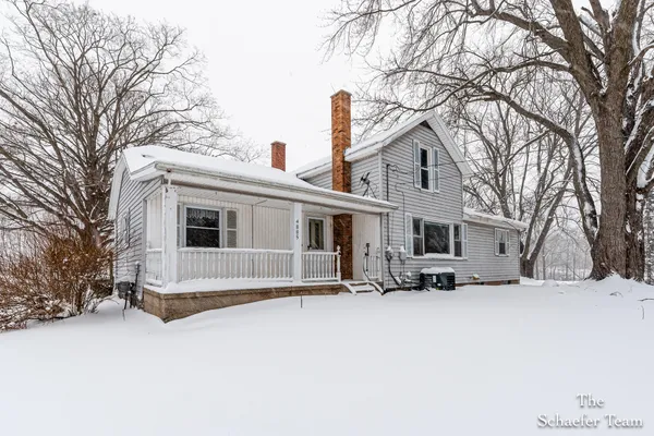 $338,000 | 4885 Gavin Lake Road Northeast, Ada, MI 49301