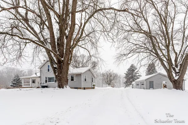 $338,000 | 4885 Gavin Lake Road Northeast, Ada, MI 49301