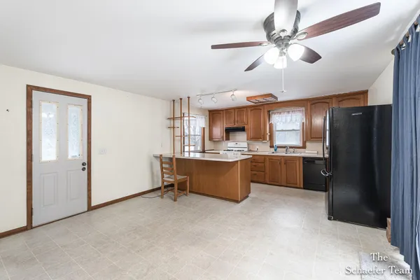 $338,000 | 4885 Gavin Lake Road Northeast, Ada, MI 49301