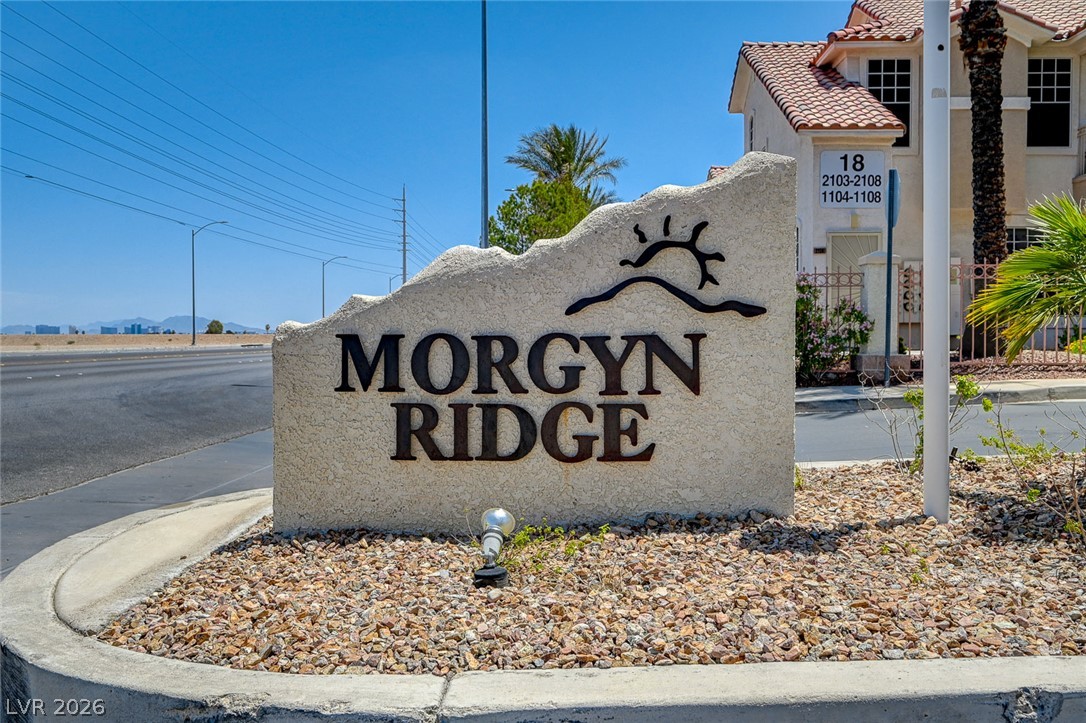 8555 West Russell Road, Unit 1017 Las Vegas, NV 89113 - Photo 34 of 34 The 'Morgyn Ridge' sign marks the entrance to this community with desert-friendly landscaping.