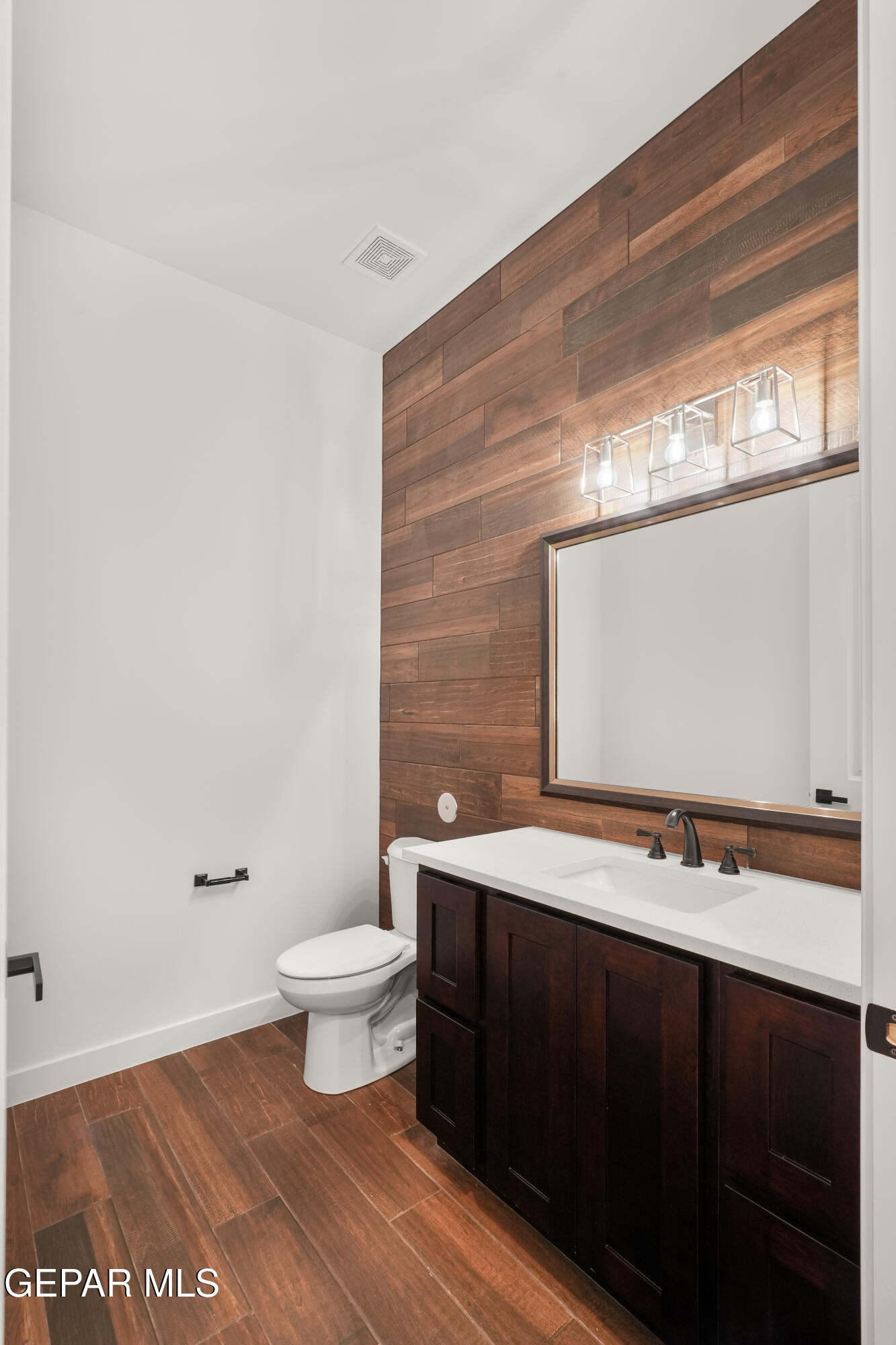 5953 Ruidoso Downs Street El Paso, TX 79932 - Photo 25 of 56 a bathroom with a sink and a toilet