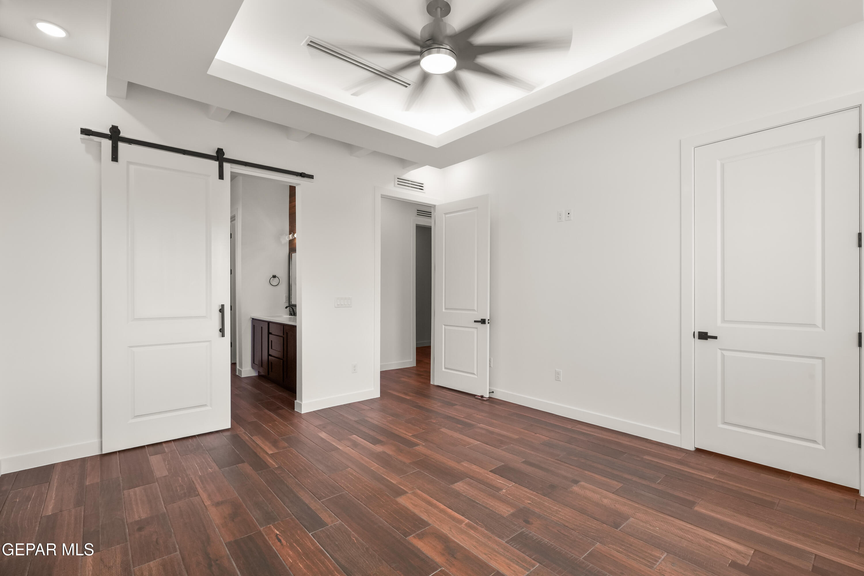 5953 Ruidoso Downs Street El Paso, TX 79932 - Photo 30 of 56 a view of empty room with wooden floor