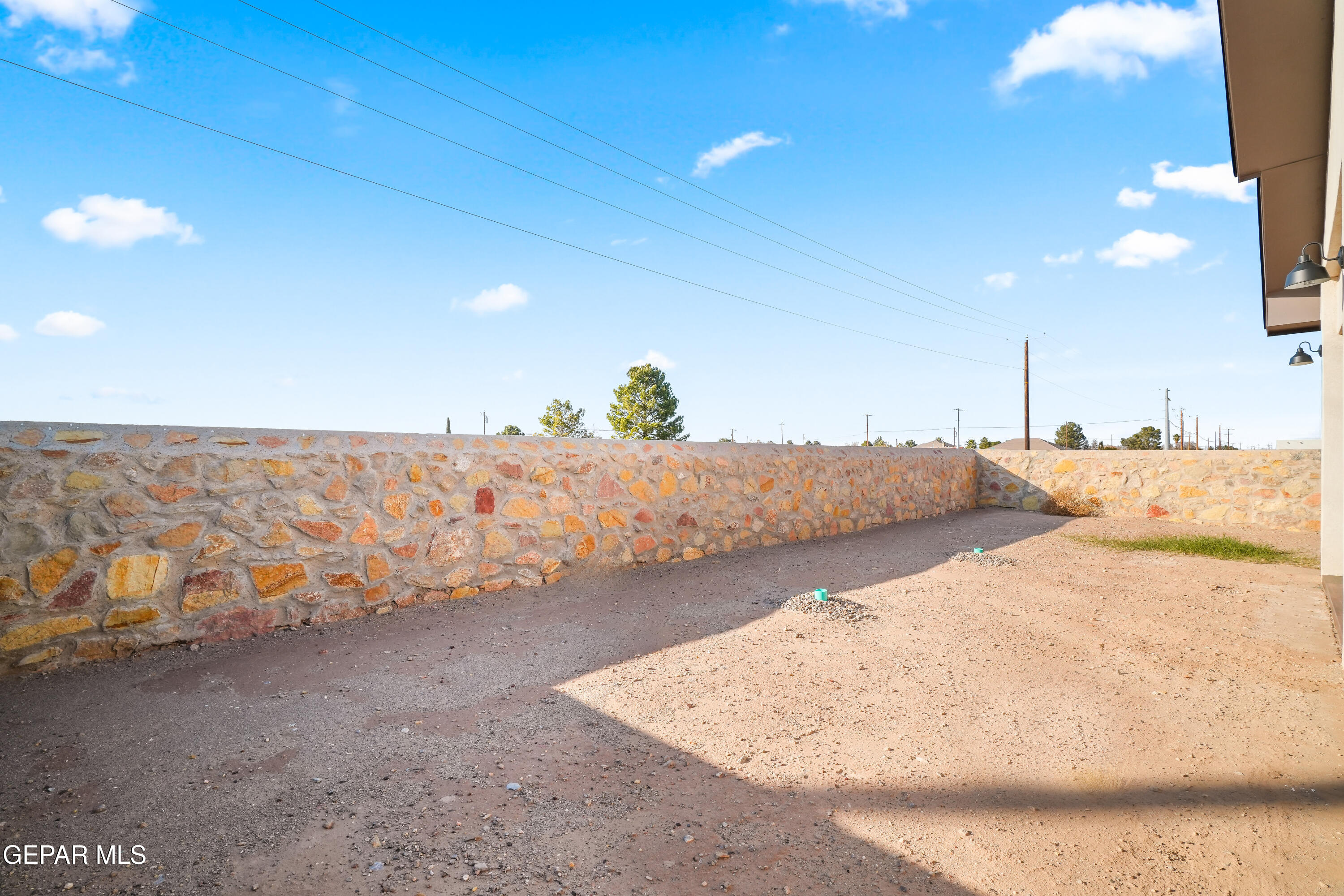 5953 Ruidoso Downs Street El Paso, TX 79932 - Photo 46 of 56 a view of bedroom with furniture and lamp