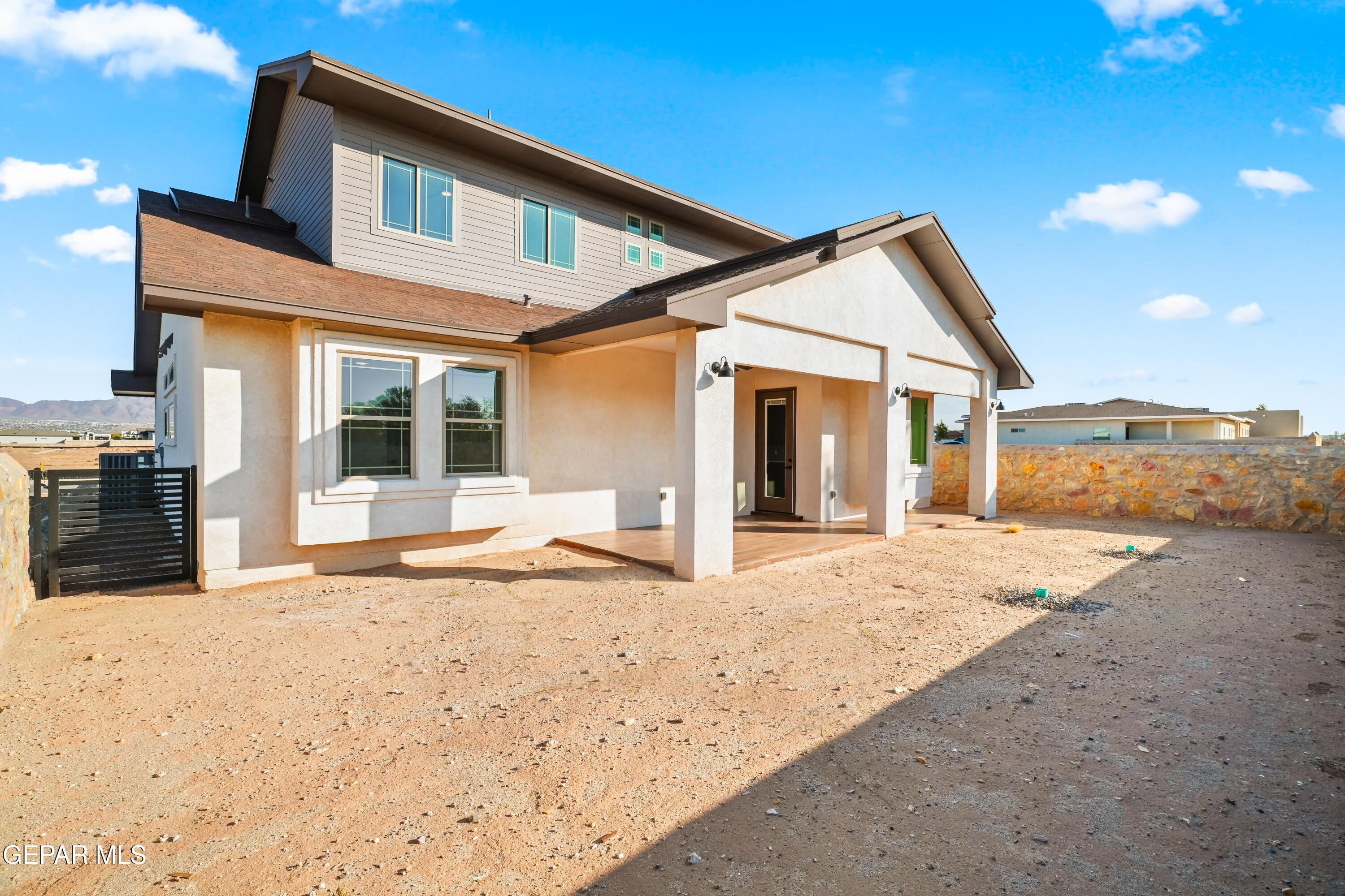 5953 Ruidoso Downs Street El Paso, TX 79932 - Photo 47 of 56 a view of a house with a snow in the background