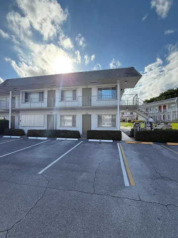 a view of a building with a street