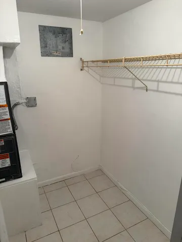 a view of a room with racks on the wall