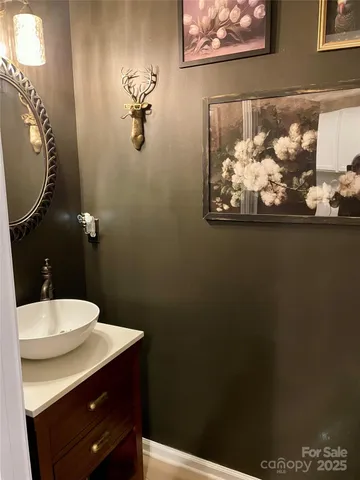 a bedroom with a bed and a mirror