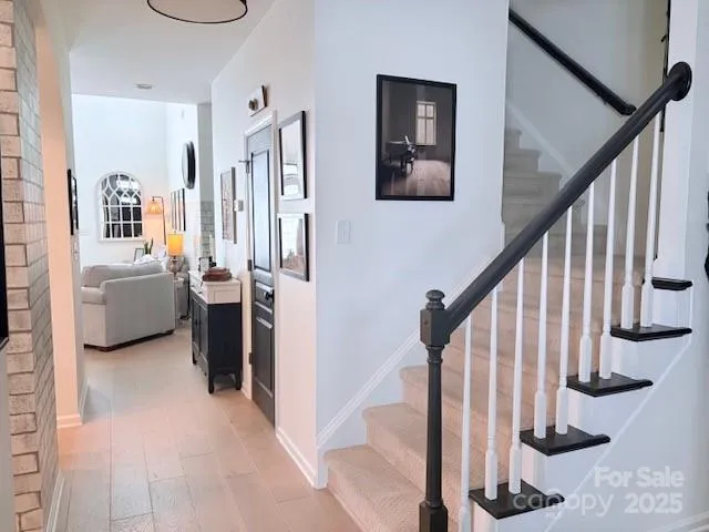 a view of a kitchen with microwave and cabinets