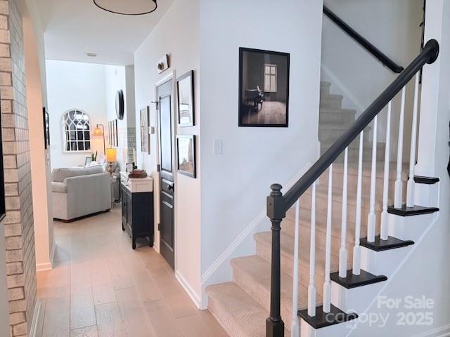 518 Pine Links Drive Tega Cay, SC 29708 - Photo 3 of 36 a view of a livingroom with entryway and stairs