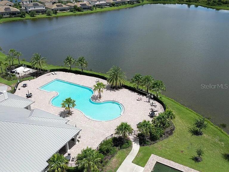 17006 Blue Ridge Place Bradenton, FL 34211 - Photo 27 of 38 an aerial view of a house with a yard and lake