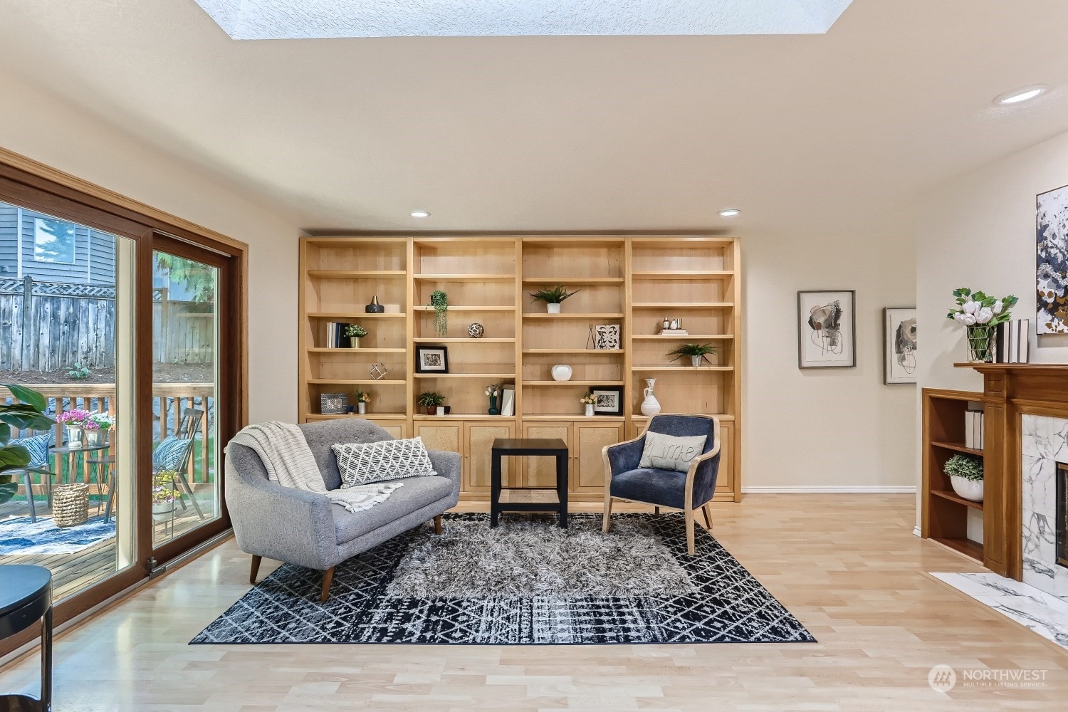 2626 242nd Place Southeast Bothell, WA 98021 - Photo 12 of 26 a living room with furniture and a rug