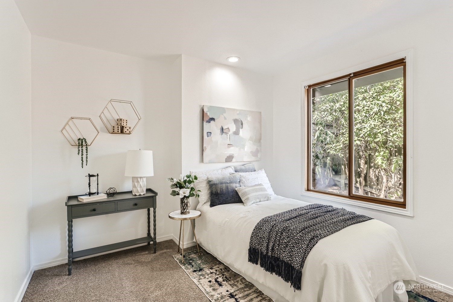 2626 242nd Place Southeast Bothell, WA 98021 - Photo 21 of 26 a bedroom with a bed and a window