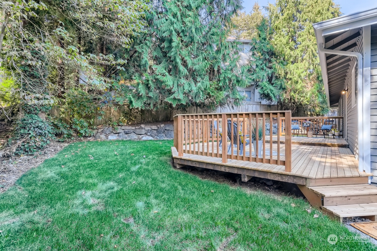 2626 242nd Place Southeast Bothell, WA 98021 - Photo 26 of 26 a view of a yard with wooden fence