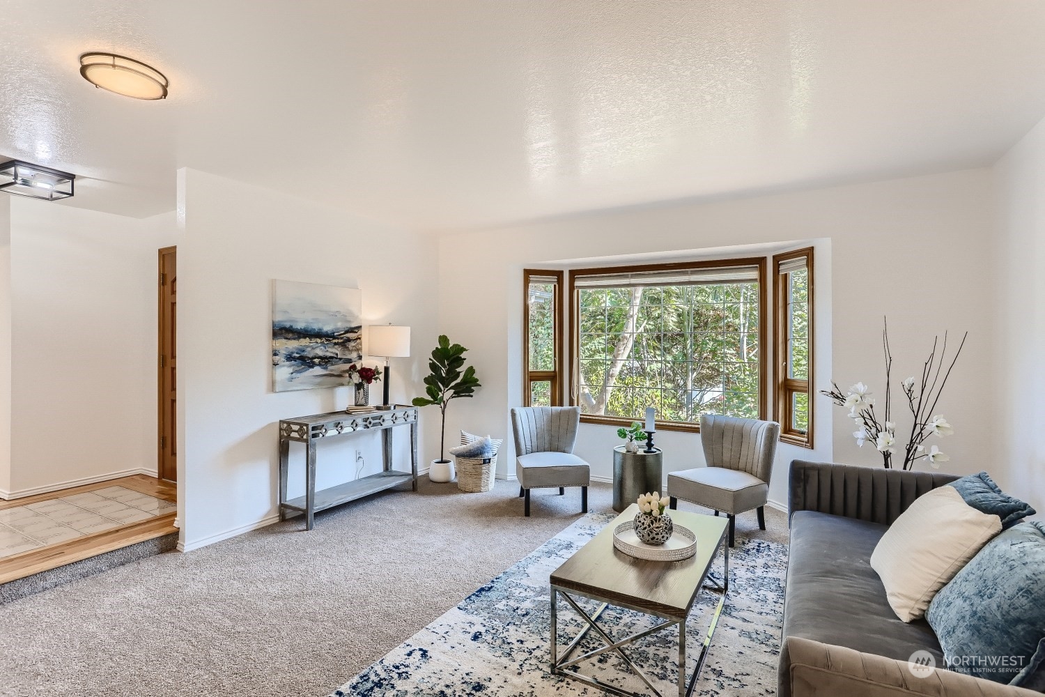 2626 242nd Place Southeast Bothell, WA 98021 - Photo 5 of 26 a living room with furniture and a window