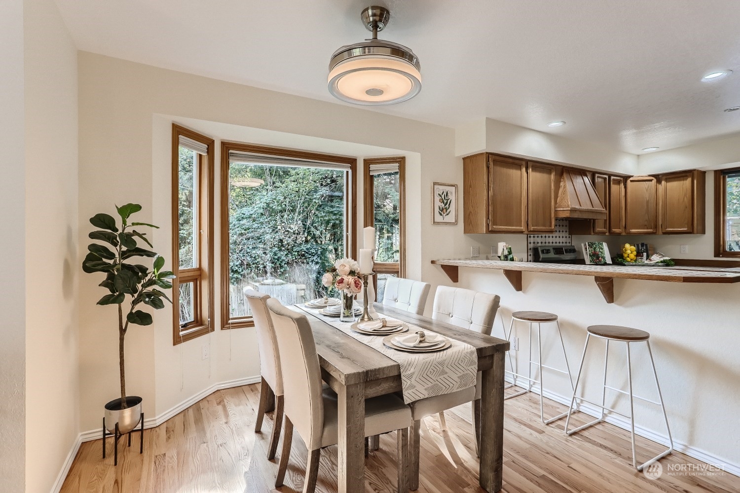 2626 242nd Place Southeast Bothell, WA 98021 - Photo 10 of 26 a view of a dining room with furniture window and outside view