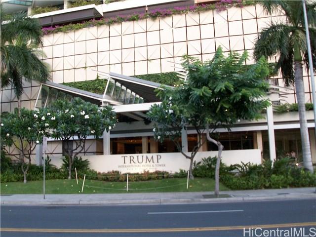 223 Saratoga Road, Unit 2001 Honolulu, HI 96815 - Photo 1 of 1 a view of a house with a yard and table and chairs