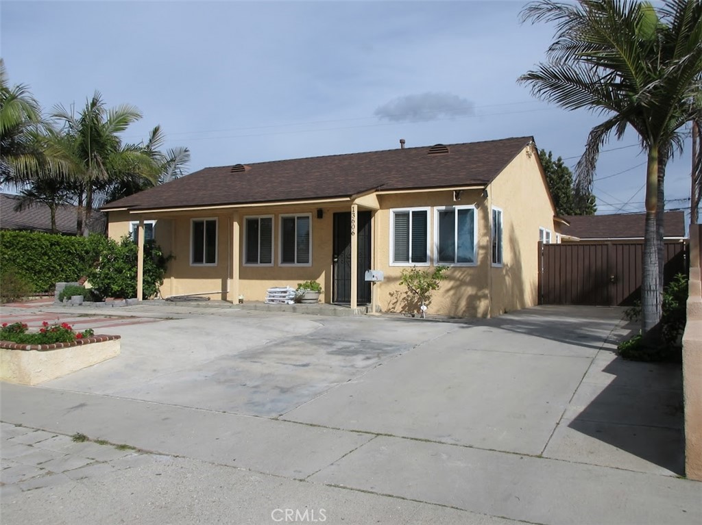 13606 Studebaker Road Norwalk, CA 90650 - Photo 1 of 1 * Long Cement Driveway Plenty Of Parking Area If Needed *